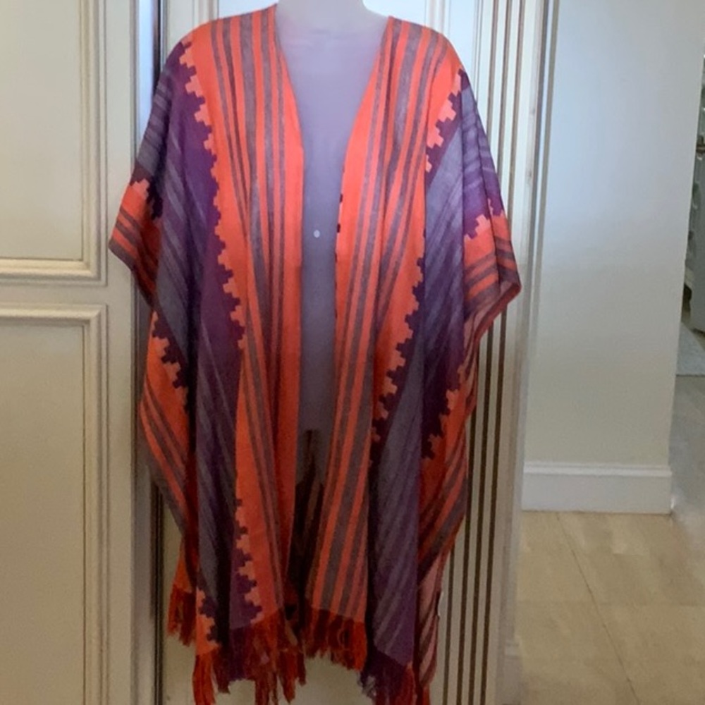 Double D ranch
Vibrant Striped Poncho